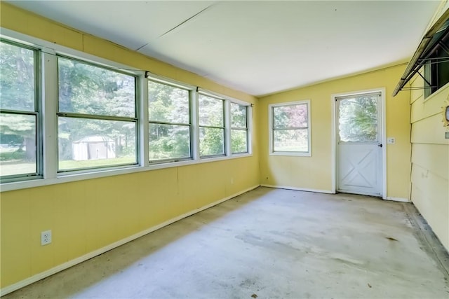 28 Berna Ln, Chili, NY 14624 - unfurnished sunroom featuring concrete flooring and lofted ceiling