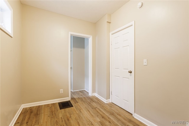 708 Garson Ave, Rochester, NY 14609 - unfurnished room featuring light wood-type flooring and a smoke detector