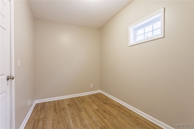 708 Garson Ave, Rochester, NY 14609 - spare room with light wood-type flooring and baseboards