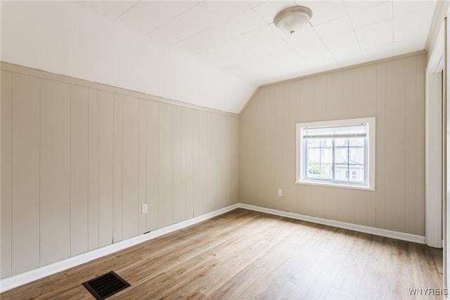 708 Garson Ave, Rochester, NY 14609 - additional living space with light wood finished floors and vaulted ceiling