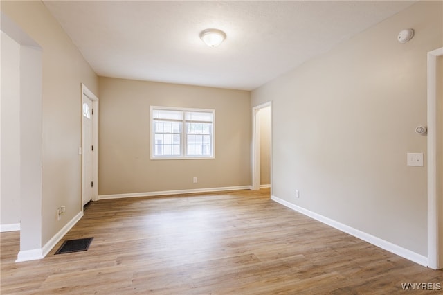 708 Garson Ave, Rochester, NY 14609 - empty room featuring a smoke detector and light wood-style flooring