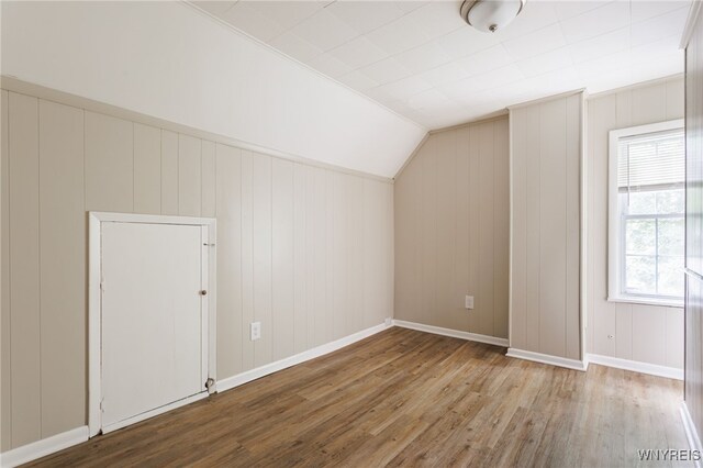 708 Garson Ave, Rochester, NY 14609 - additional living space with wood finished floors and lofted ceiling