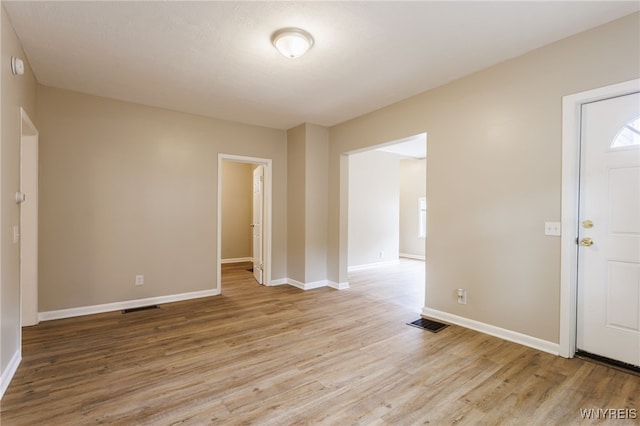 708 Garson Ave, Rochester, NY 14609 - foyer featuring light wood finished floors and baseboards
