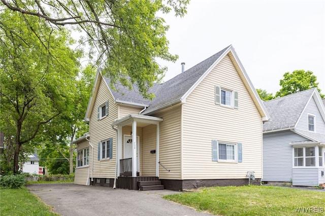 708 Garson Ave, Rochester, NY 14609 - view of front of property featuring a front yard and asphalt driveway