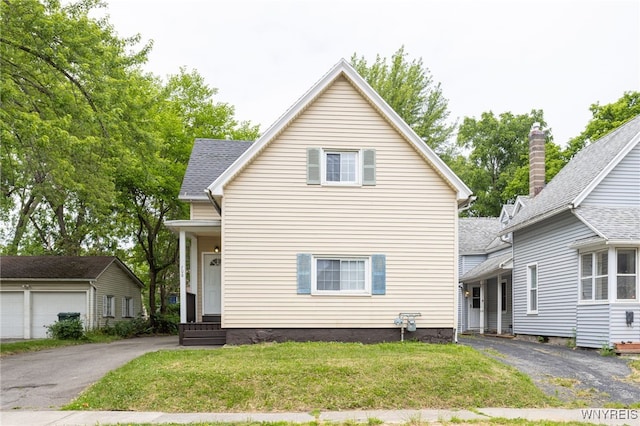 708 Garson Ave, Rochester, NY 14609 - traditional home with a front yard and an outbuilding