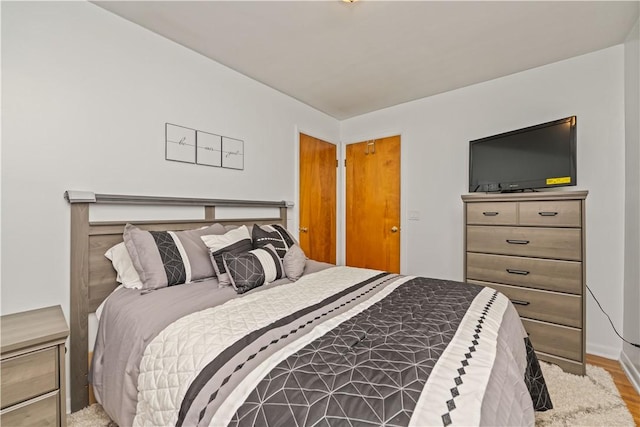 1732 Buffalo Rd, Gates, NY 14624 - bedroom featuring wood finished floors and baseboards