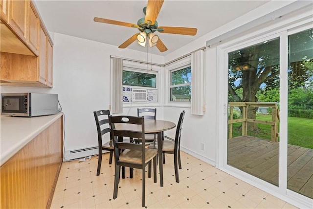 1732 Buffalo Rd, Gates, NY 14624 - dining area featuring light flooring, a baseboard radiator, ceiling fan, and cooling unit