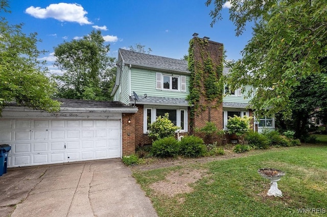 1065 W River Rd, Grand Island, NY 14072 - traditional home featuring a chimney, concrete driveway, an attached garage, a front lawn, and brick siding