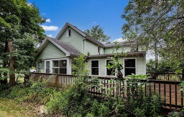 1065 W River Rd, Grand Island, NY 14072 - back of house with a wooden deck and a shingled roof