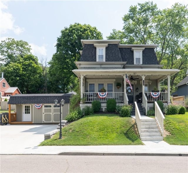 157 Dennis Ave, Hornell, NY 14843 - victorian home with mansard roof, roof with shingles, covered porch, and a front lawn