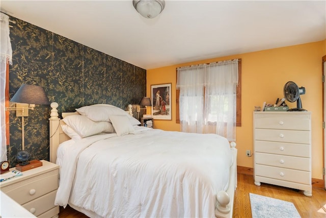 157 Dennis Ave, Hornell, NY 14843 - bedroom with wood finished floors and an accent wall