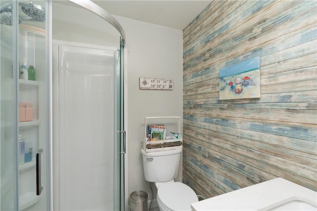 157 Dennis Ave, Hornell, NY 14843 - bathroom with wooden walls, a stall shower, and an accent wall