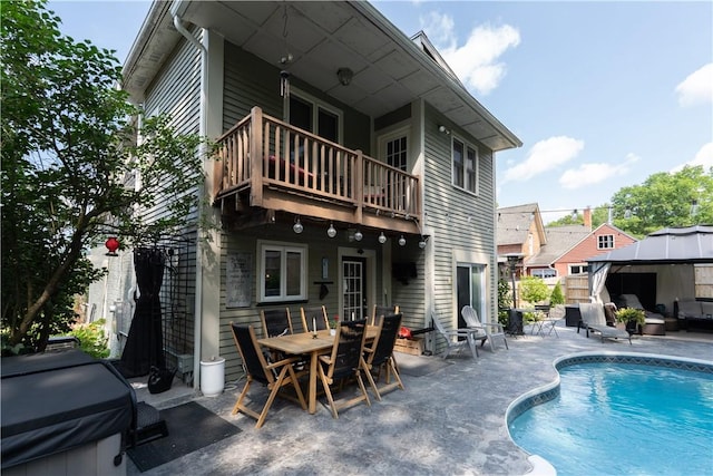157 Dennis Ave, Hornell, NY 14843 - back of house with a balcony, a patio area, a gazebo, an outdoor pool, and outdoor dining area