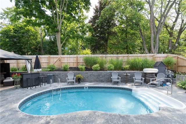 157 Dennis Ave, Hornell, NY 14843 - view of pool featuring a patio area, a fenced backyard, and view of scattered trees