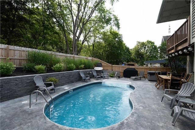 157 Dennis Ave, Hornell, NY 14843 - view of pool featuring a patio area, a fenced backyard, and view of wooded area