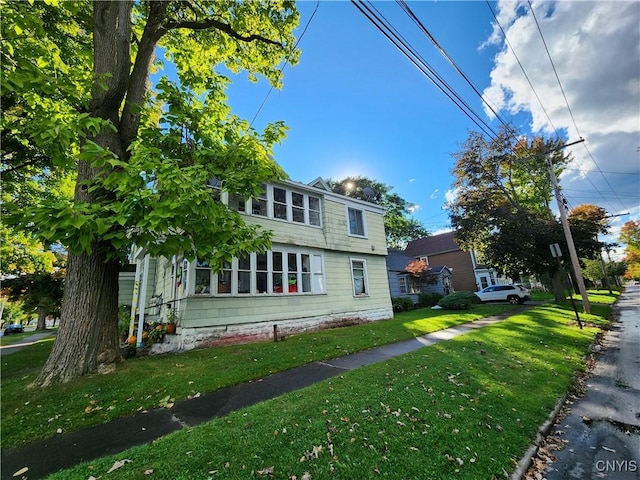 116 E Heman St, Dewitt, NY 13057 - view of side of home with a yard