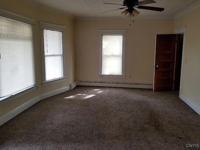 116 E Heman St, Dewitt, NY 13057 - carpeted spare room featuring a baseboard heating unit and ceiling fan
