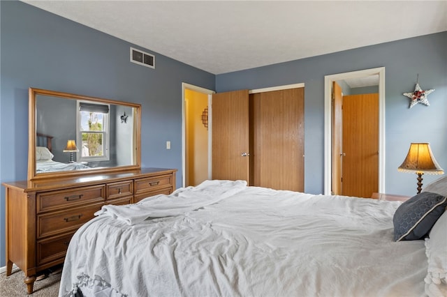 111 Farrell Road Ext, Henrietta, NY 14586 - carpeted bedroom featuring a closet and baseboards