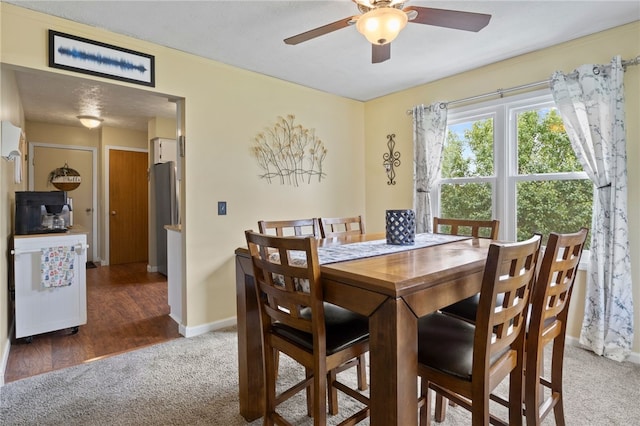 111 Farrell Road Ext, Henrietta, NY 14586 - carpeted dining space featuring ceiling fan and baseboards