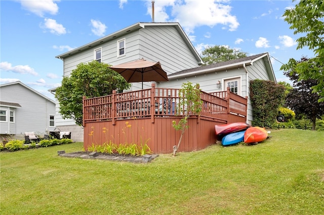 111 Farrell Road Ext, Henrietta, NY 14586 - back of property featuring a wooden deck and a yard