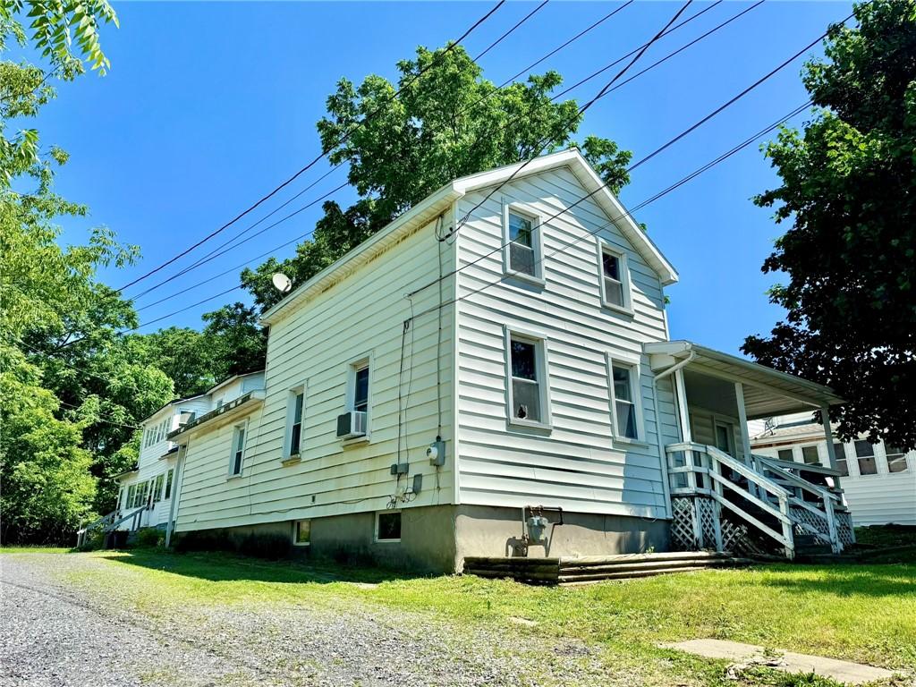 17 Perrine St, Auburn, NY 13021 - view of front of home featuring a front lawn, cooling unit, and a porch