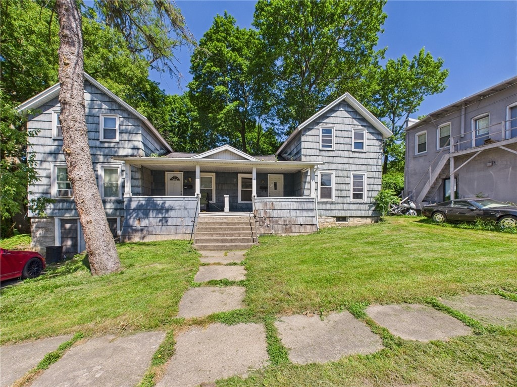 1-3 Lizette St, Auburn, NY 13021 - view of front of house with covered porch and a front lawn