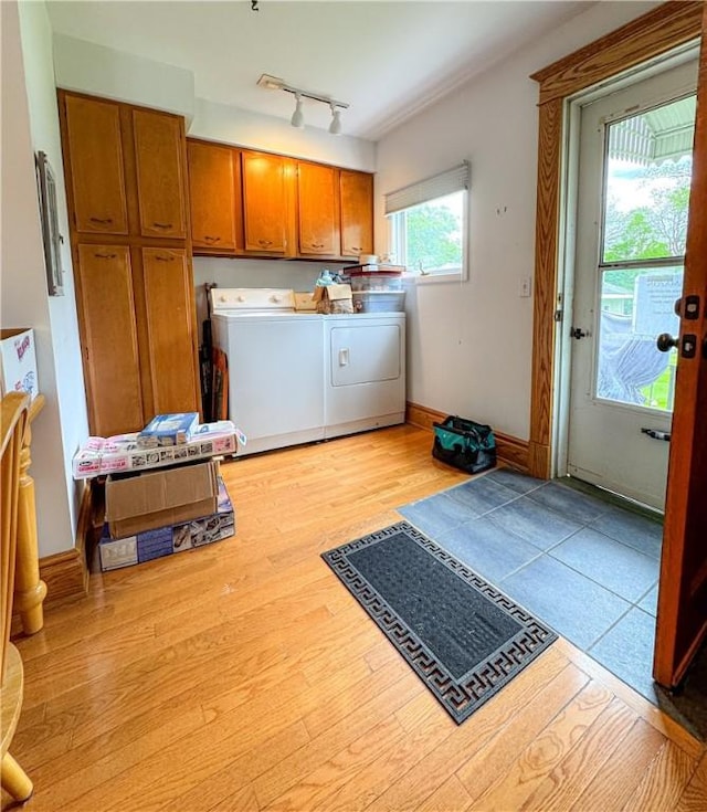 80 E Main St, Leroy, NY 14482 - washroom with cabinet space, washer and dryer, and light wood-type flooring
