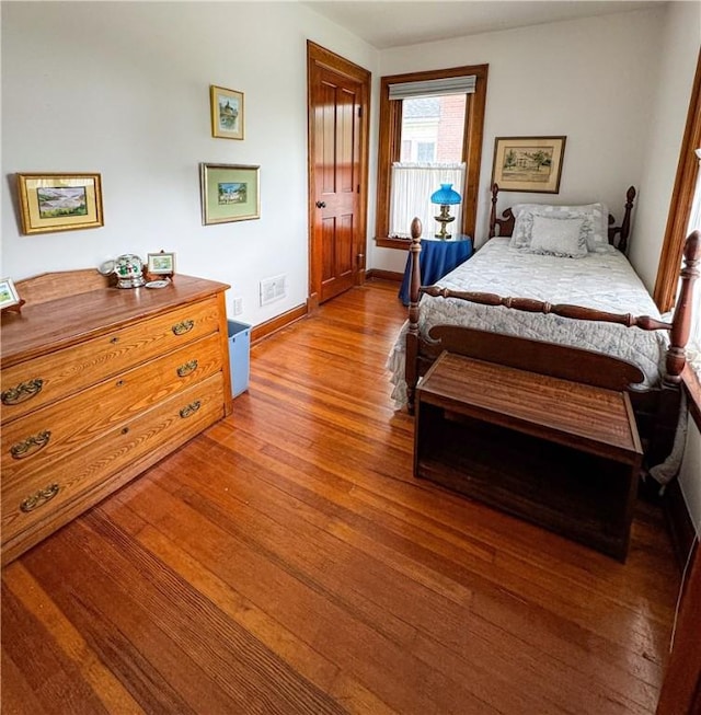 80 E Main St, Leroy, NY 14482 - bedroom featuring wood finished floors and baseboards