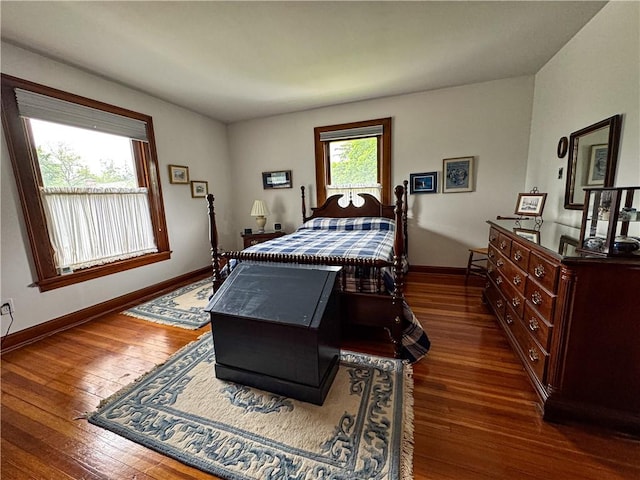 80 E Main St, Leroy, NY 14482 - bedroom featuring dark wood-type flooring