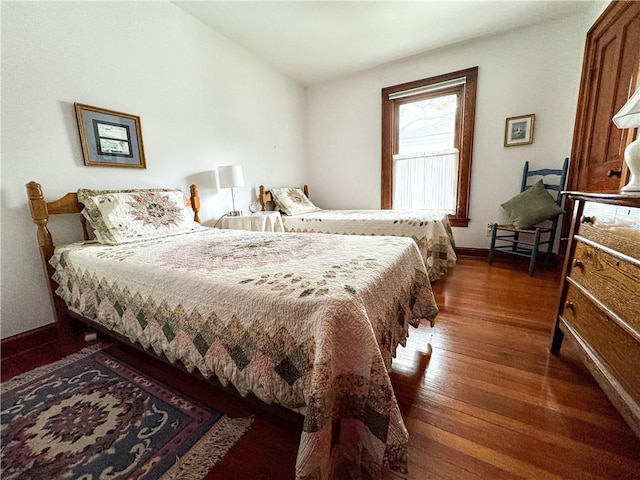 80 E Main St, Leroy, NY 14482 - bedroom featuring dark wood-type flooring and baseboards