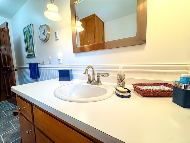 80 E Main St, Leroy, NY 14482 - bathroom featuring vanity and wainscoting