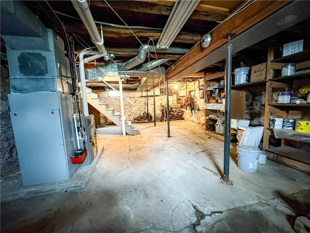 80 E Main St, Leroy, NY 14482 - unfinished below grade area featuring stairway and heating unit