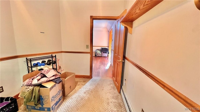 7320 E Flats Rd, East Otto, NY 14729 - corridor with light tile patterned flooring and a baseboard radiator