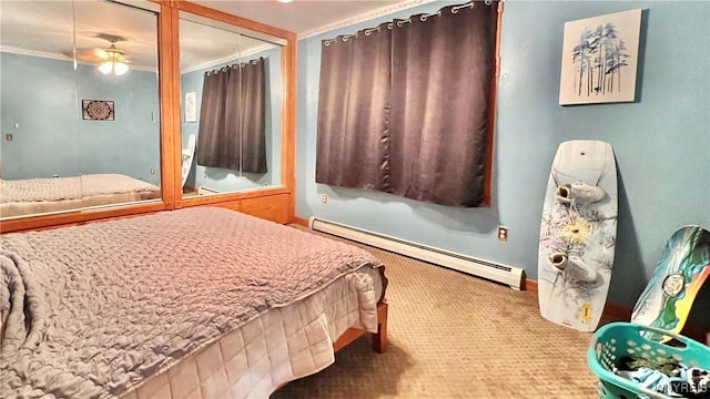 7320 E Flats Rd, East Otto, NY 14729 - bedroom with a baseboard radiator, carpet floors, two closets, and crown molding