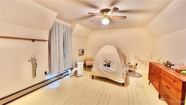 7320 E Flats Rd, East Otto, NY 14729 - bedroom featuring a baseboard heating unit, lofted ceiling, wood finished floors, and ceiling fan