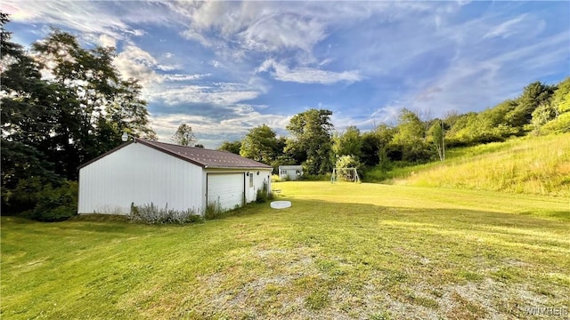 7320 E Flats Rd, East Otto, NY 14729 - view of yard featuring a garage and an outdoor structure