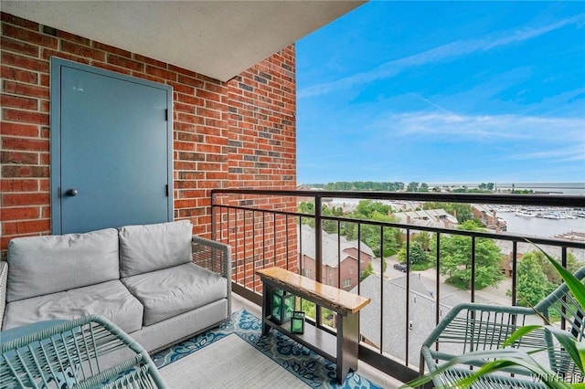 803 Admirals Walk Unit 803, Buffalo, NY 14202 - balcony featuring a water view and an outdoor hangout area