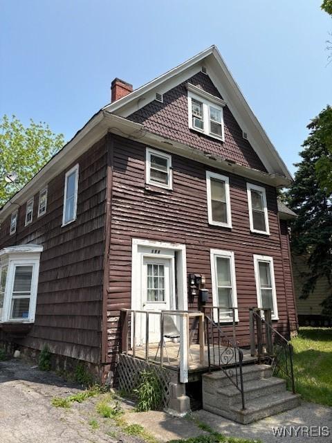 184 Goundry St, North Tonawanda, NY 14120 - view of front of home featuring a chimney