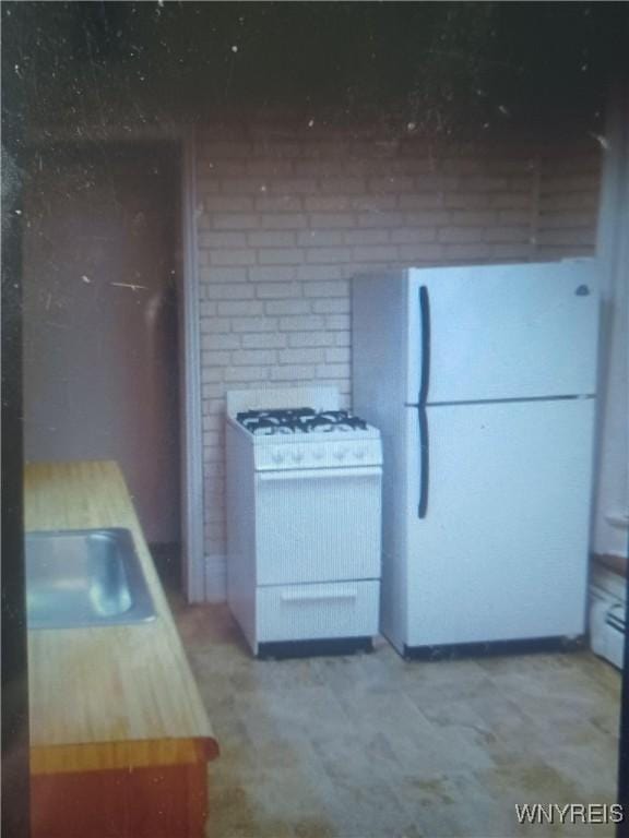 184 Goundry St, North Tonawanda, NY 14120 - kitchen with white appliances and a sink
