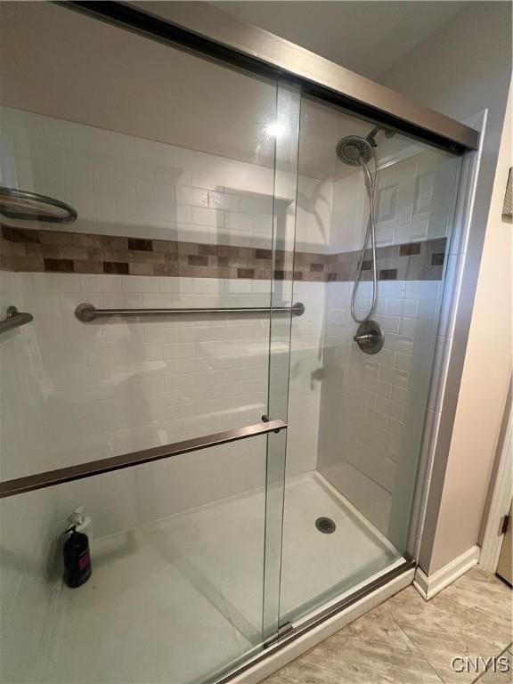 206 Wembridge Dr, Dewitt, NY 13057 - full bath with a shower stall and baseboards