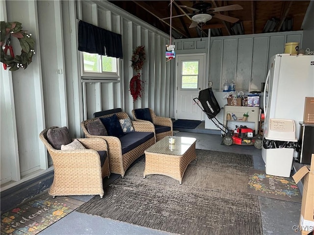 206 Wembridge Dr, Dewitt, NY 13057 - living room with a ceiling fan and concrete floors