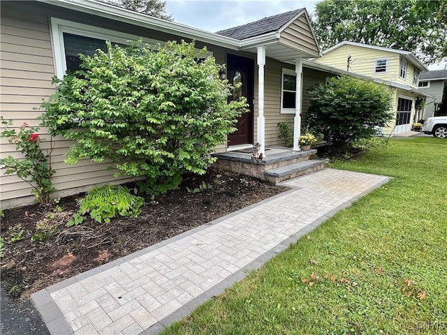 206 Wembridge Dr, Dewitt, NY 13057 - property entrance with a lawn