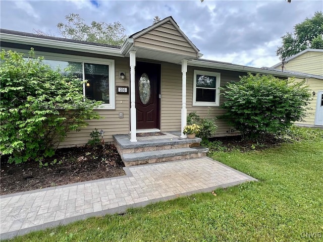 206 Wembridge Dr, Dewitt, NY 13057 - property entrance with a yard