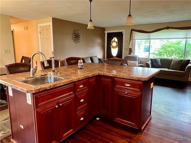 206 Wembridge Dr, Dewitt, NY 13057 - kitchen featuring dark brown cabinets, a kitchen breakfast bar, dark wood finished floors, and light countertops