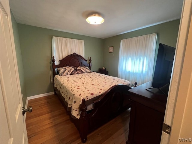 206 Wembridge Dr, Dewitt, NY 13057 - bedroom with dark wood-style flooring and baseboards