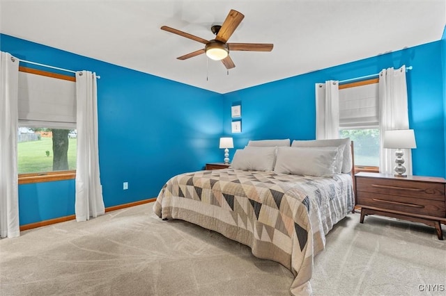 124 Morgan Ln, Oneida, NY 13421 - carpeted bedroom with a ceiling fan and baseboards