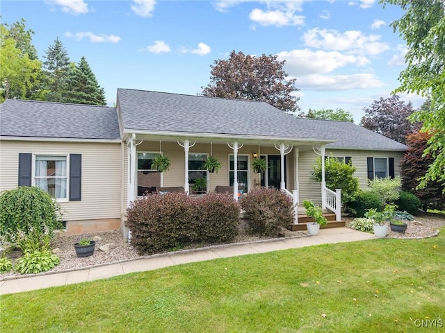 124 Morgan Ln, Oneida, NY 13421 - single story home featuring a front yard, a shingled roof, and a porch