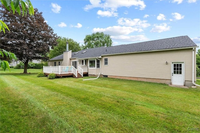 124 Morgan Ln, Oneida, NY 13421 - back of property featuring a wooden deck, a lawn, and a shingled roof