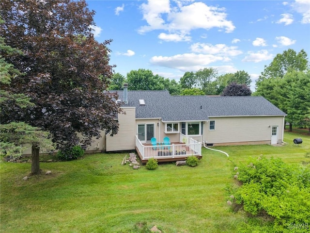 124 Morgan Ln, Oneida, NY 13421 - back of property with a deck, a lawn, and a shingled roof