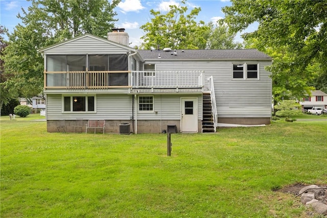 911 Copperkettle Rd, Webster, NY 14580 - back of property with stairway, a chimney, a yard, a sunroom, and a wooden deck